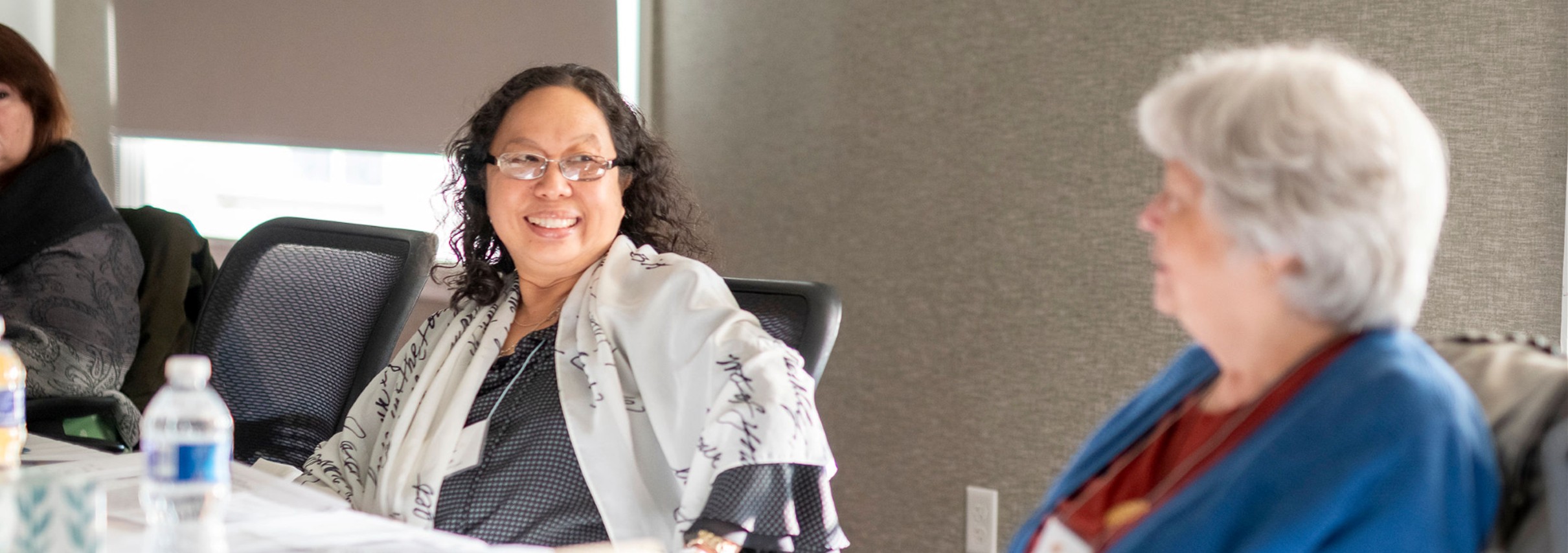 Smiling writers in workshop