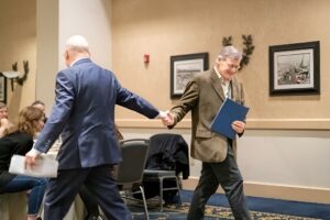 two people passing each other
